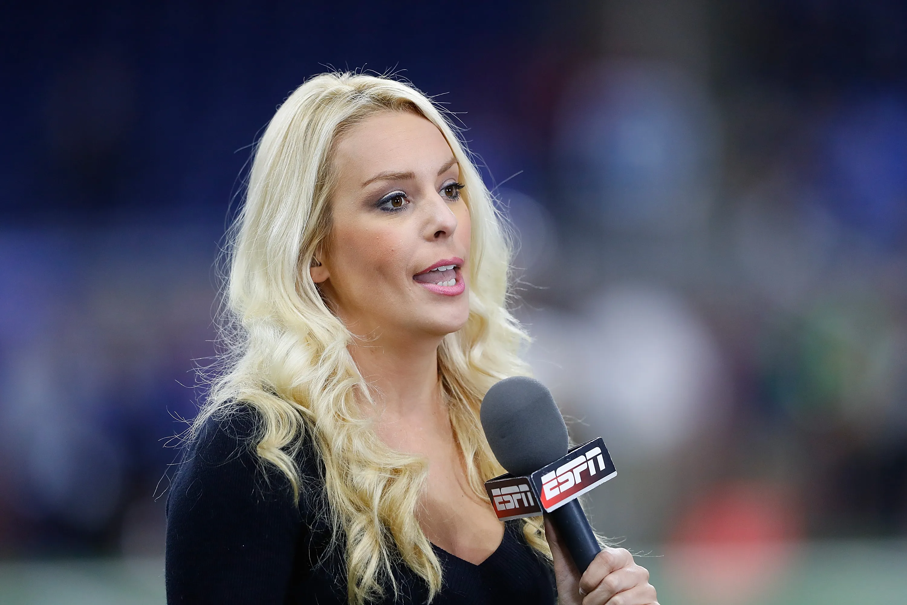ESPN sideline reporter Britt McHenry working a pregame broadcast.