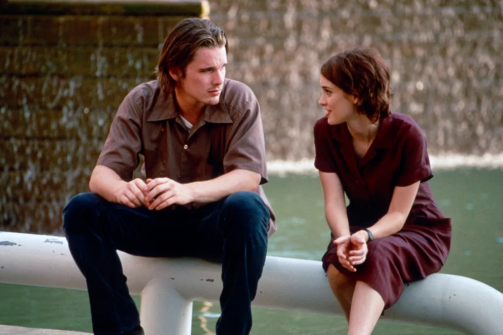 Ethan Hawke and Winona Ryder sitting together and talking in a scene from the film