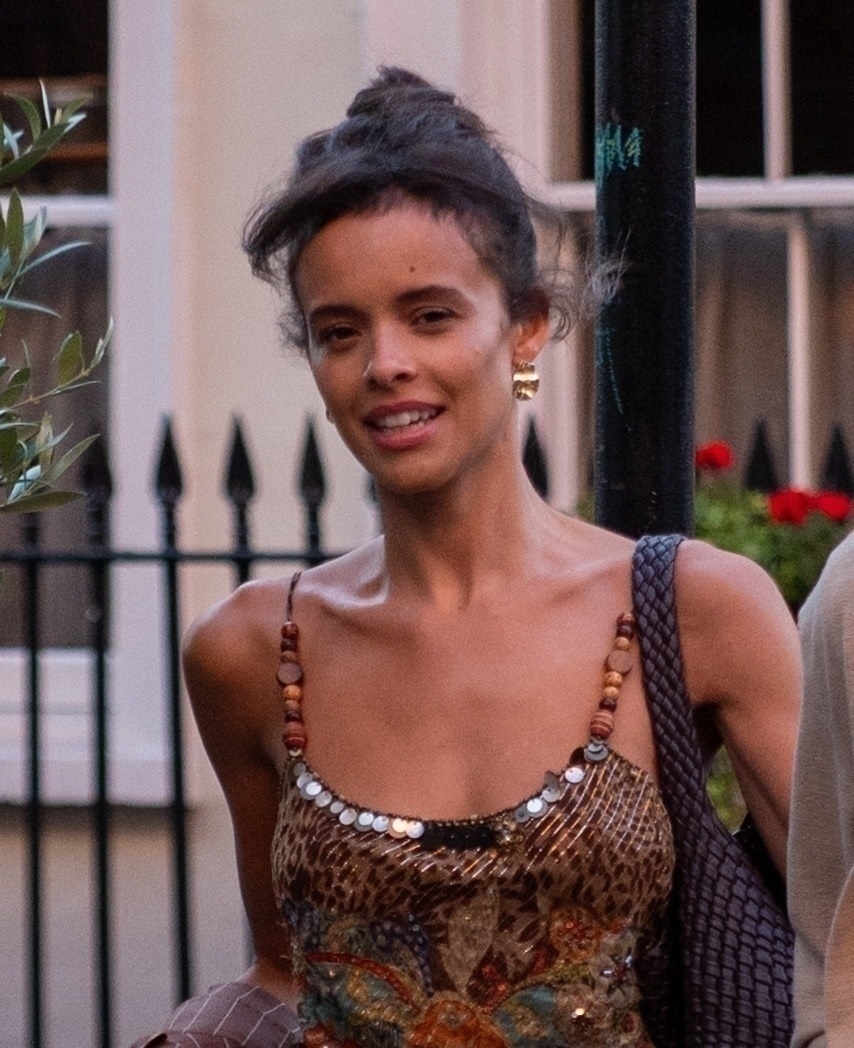 Aubrey Cleland smiling on a London street.