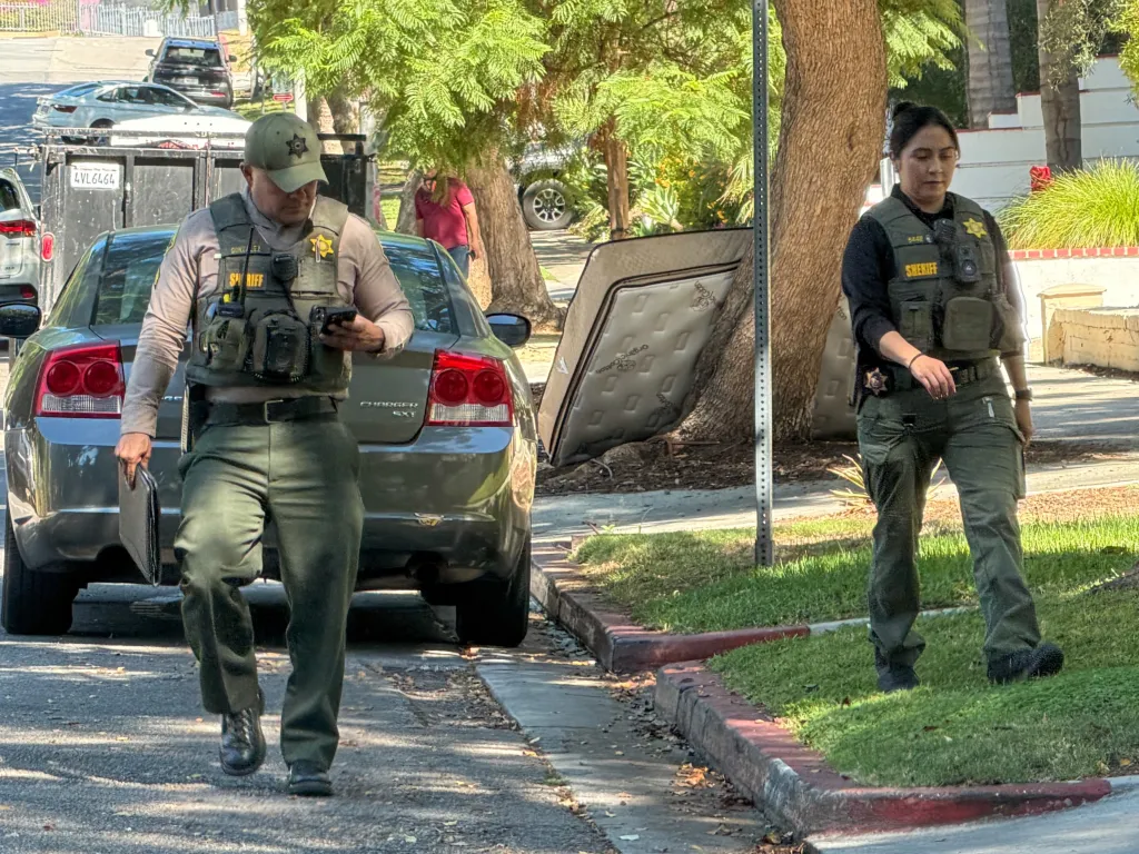 Los Angeles County Sheriffs arrive outside the home of Pretty Little Liars star Keegan Allen after he was robbed.