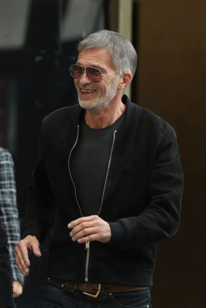 Olivier Martinez wearing a black jacket and sunglasses after leaving court in downtown Los Angeles.