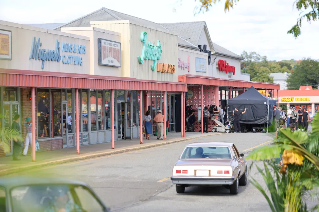 Austin Butler films the 'Miami Vice' remake on a shopping center set in New Jersey.