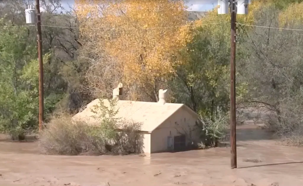 A home surrounded by floodwaters.