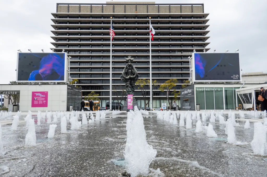 The Los Angeles Department of Water and Power building viewed from the Music Center plaza, with a fountain in the foreground.
