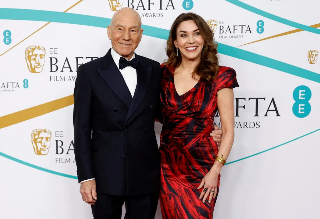 Patrick Stewart and Sunny Ozell arriving at the BAFTA Film Awards.