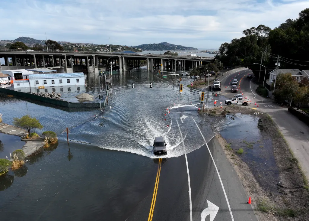 Floodwaters cover roads during high tide in Mill Valley, Marin County, California.