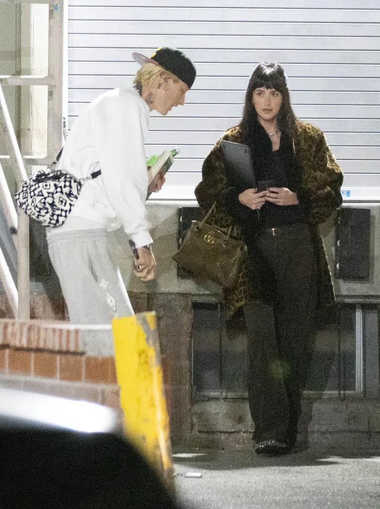 Dakota Johnson and Machine Gun Kelly outside a music studio in Los Angeles.