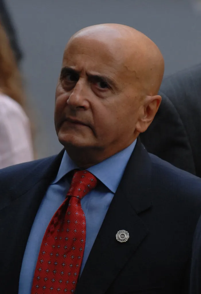 Former NYSE boss Dick Grasso at the funeral services for firefighter Robert Beddia.
