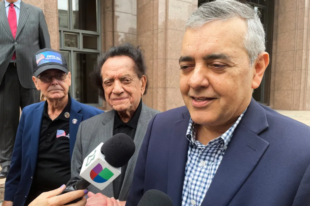 Former US Rep. David Rivera speaking to reporters in December 2022, was sentenced to 10 years in prison for his secret lobbying campaign in Venezuela.