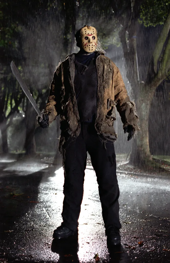 Ken Kirzinger as Jason Voorhees holding a machete in the rain from 