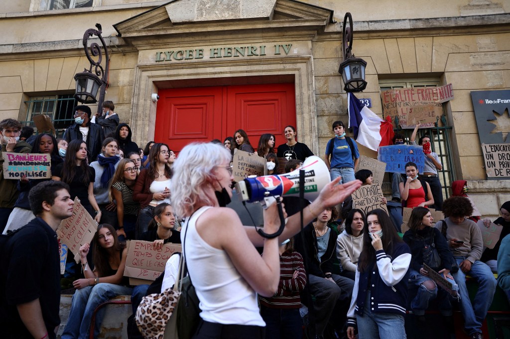 French high school students gather outside the Lycée Henri IV in Paris during a nationwide day of demonstrations and blockades over issues including overcrowded classrooms, teacher shortages and dilapidated school buildings.