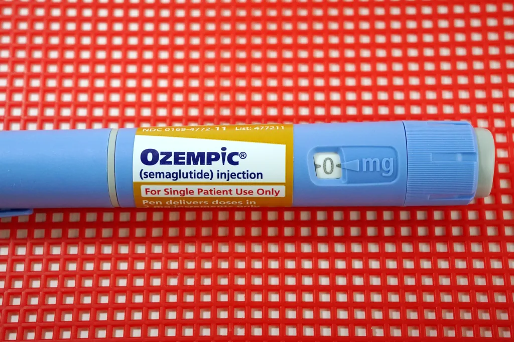 An Ozempic injection applicator pen set to 0 mg.