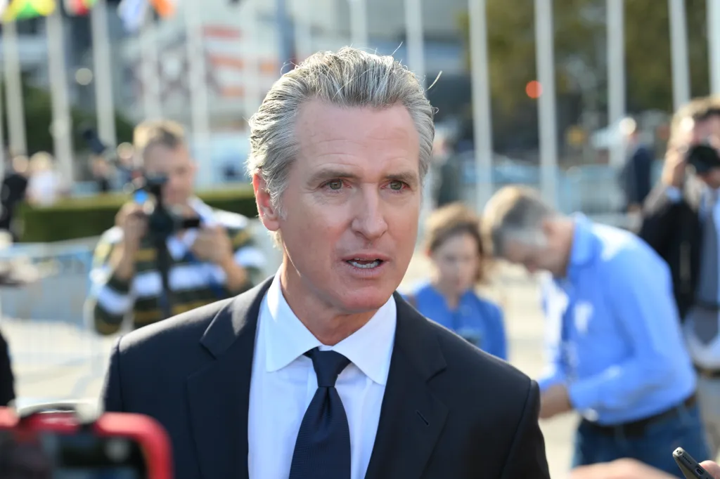 California Governor Gavin Newsom speaks with reporters outside the United Nations Headquarters.