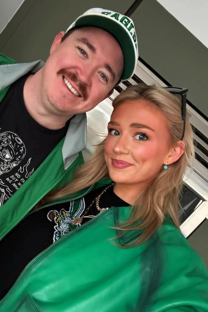Grace Brassel and Shane Gillis smiling together.