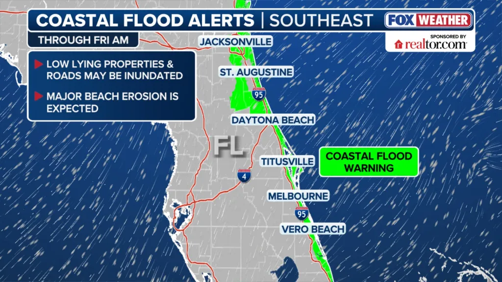 Weather map of Florida showing coastal flood warnings along the Atlantic coast from Jacksonville to Vero Beach, with wind symbols over the ocean.
