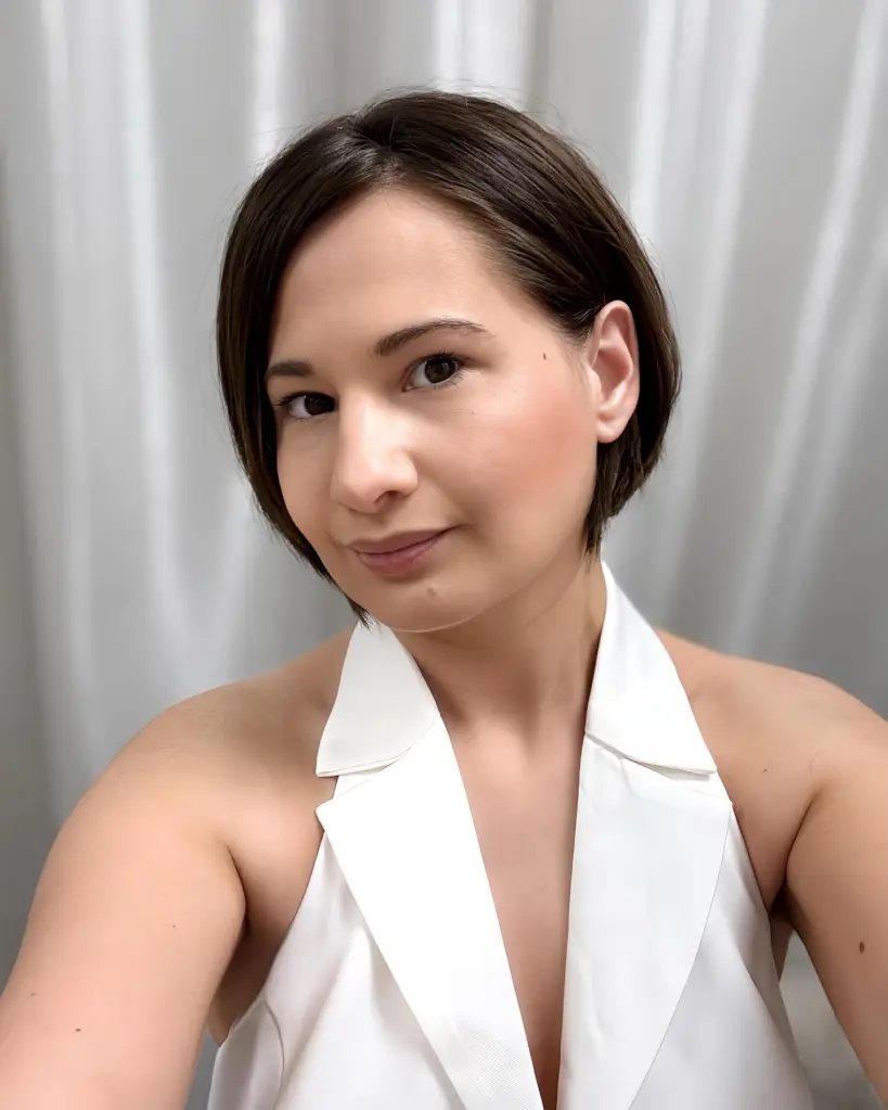 Gypsy-Rose Blanchard wearing a white top with a collared V-neck.