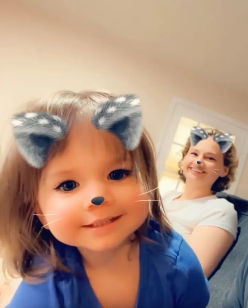 Gypsy Rose Blanchard and her daughter using a cat filter.