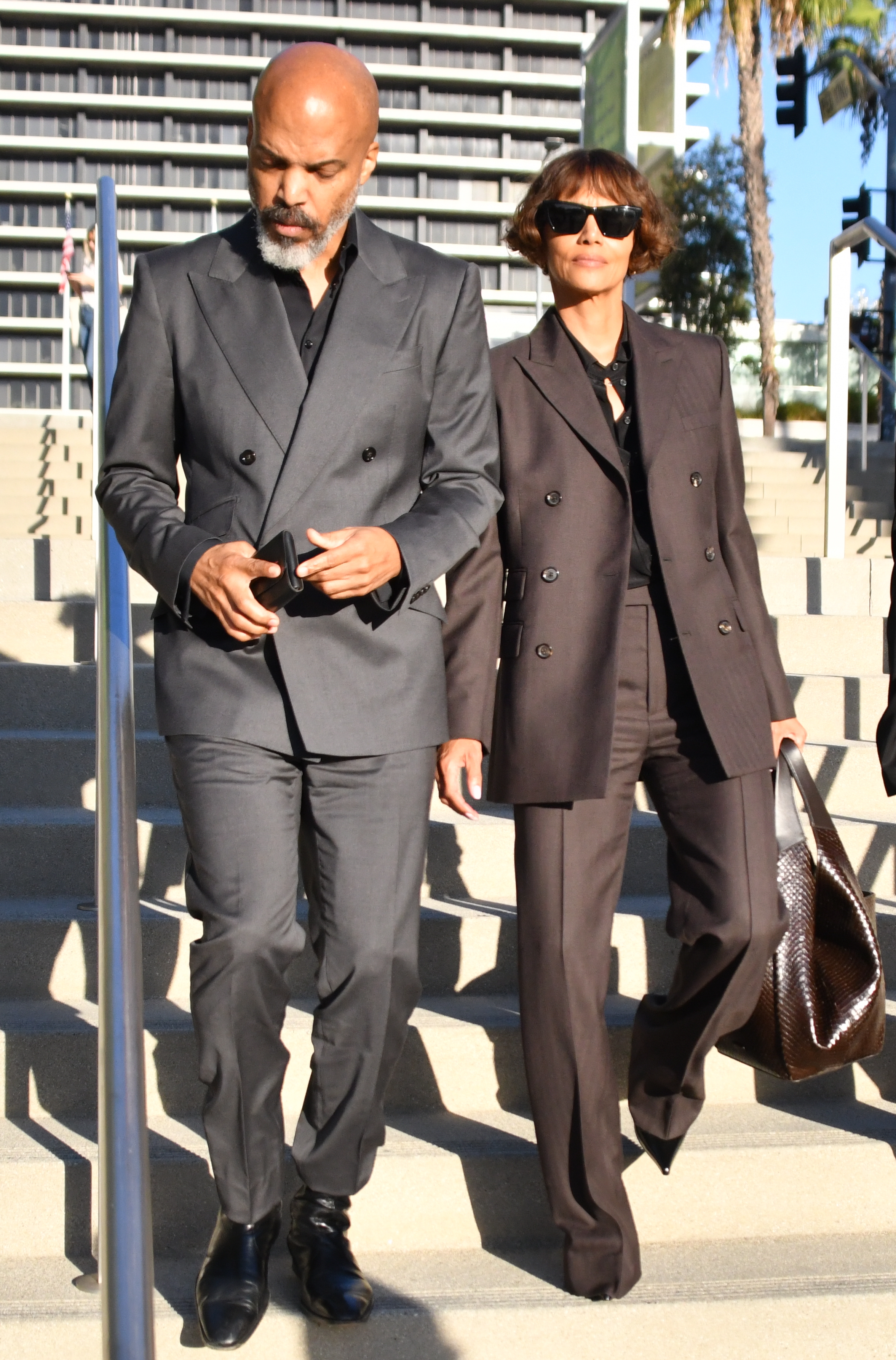 Halle Berry and Van Hunt arrive at a courthouse for a custody hearing.