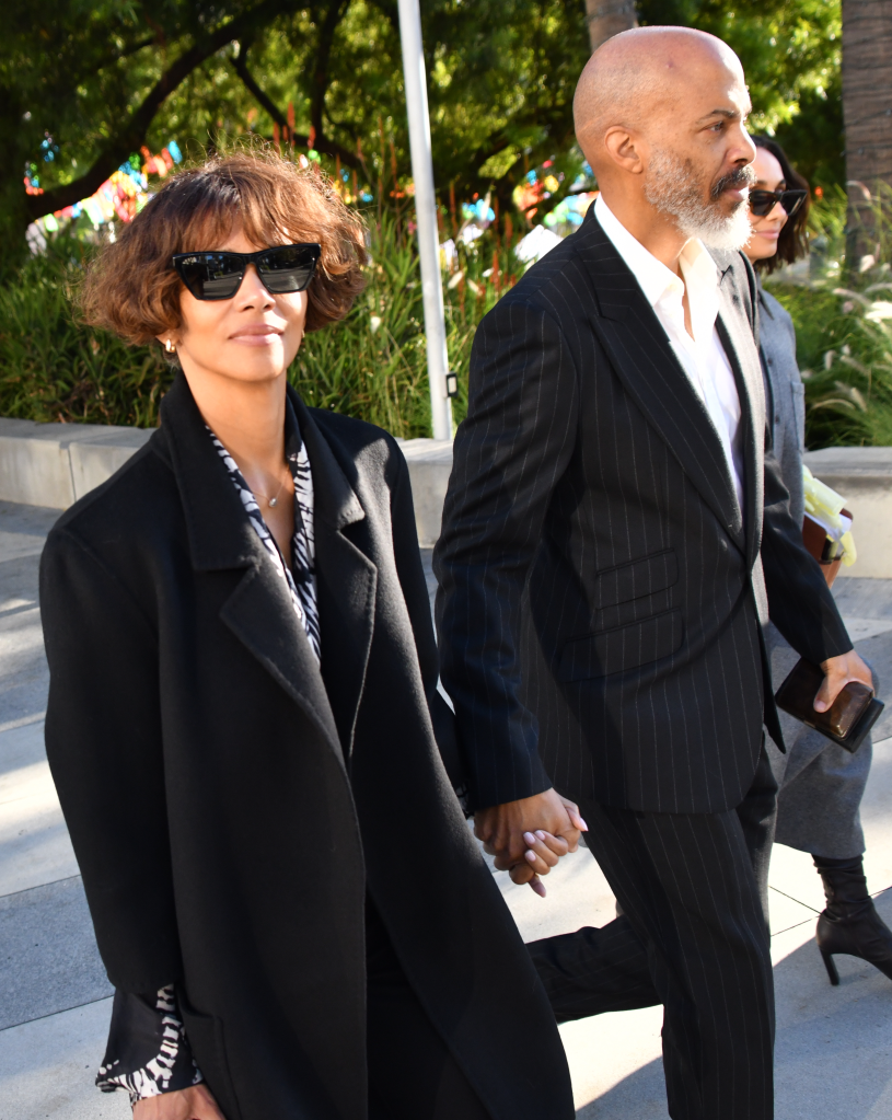 Halle Berry and Van Hunt holding hands while arriving at the Stanley Mosk courthouse.