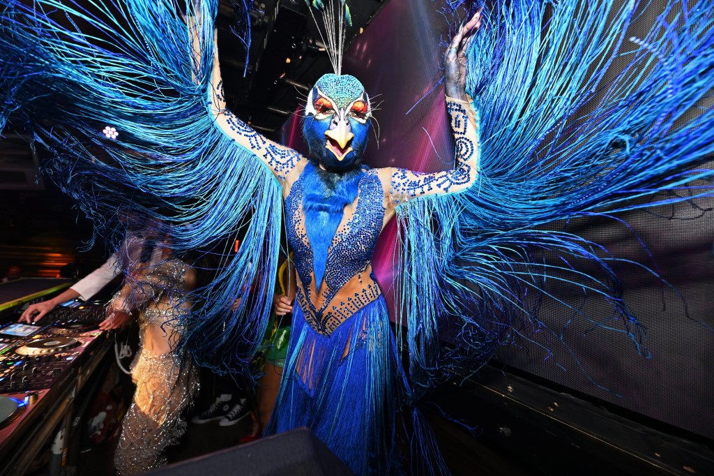 Heidi Klum in a peacock costume at her Halloween party.