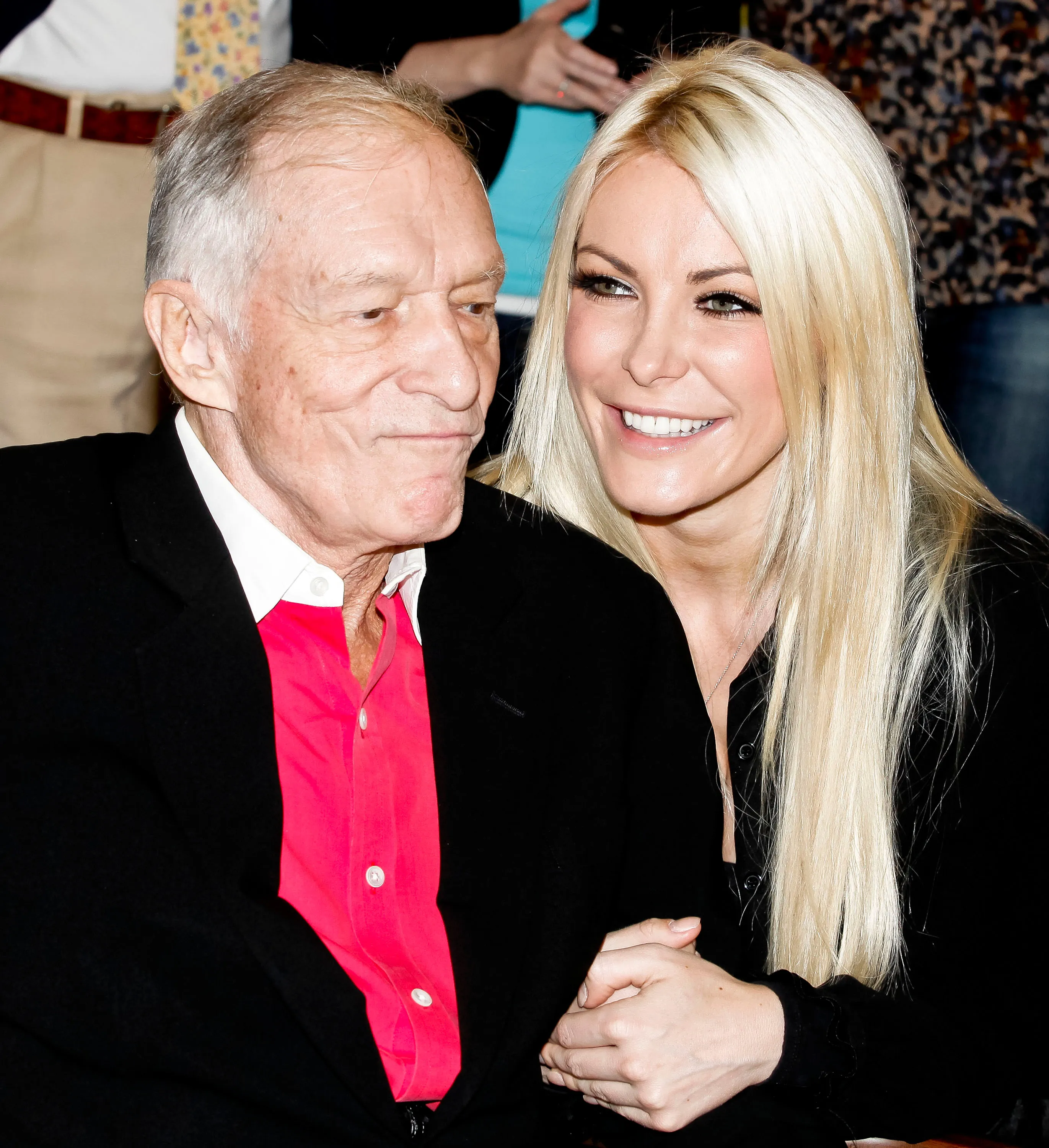 Hugh Hefner and Crystal Harris attend the Beverly Hills Playboy World Headquarters ribbon-cutting ceremony.