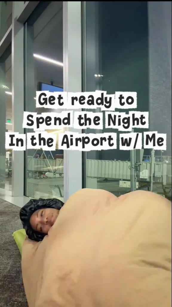 Santeon Brown lying on the floor of an airport terminal wrapped in a blanket, with text overlay reading 