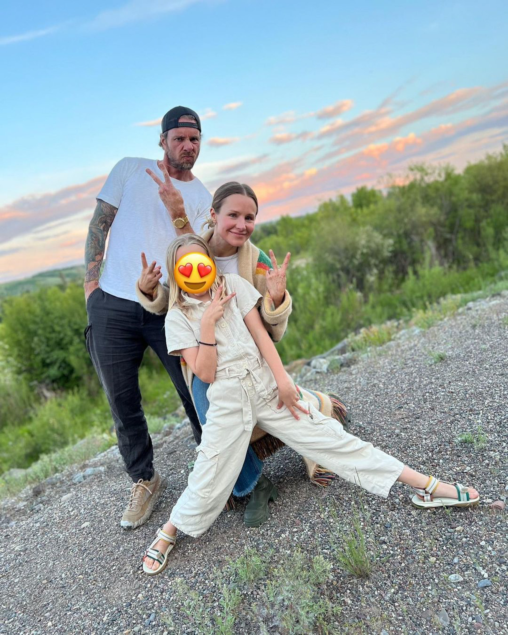 Kristen Bell and Dax Shepard with one of their daughters
