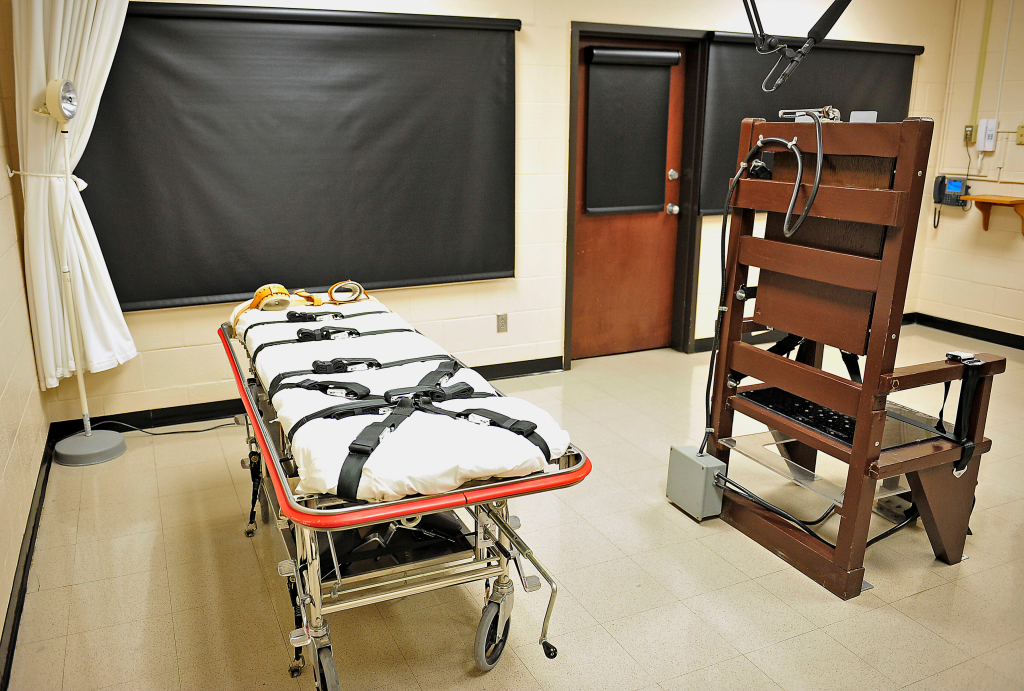 An injection gurney and electric chair in the death chamber at Riverbend Maximum Security Institution.