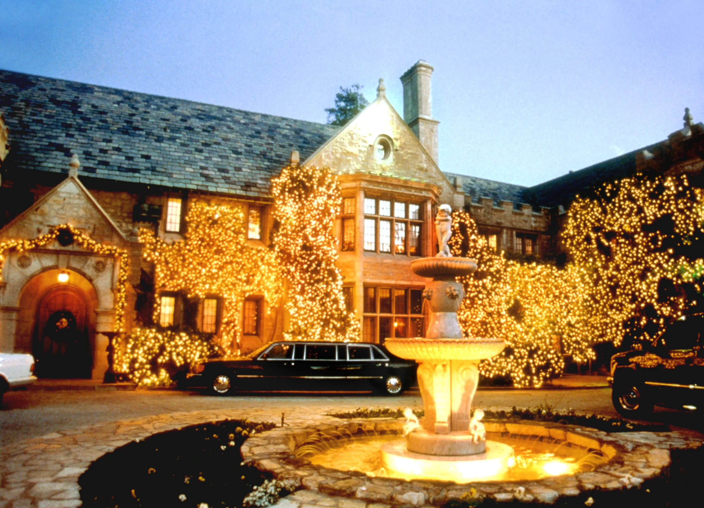 Hugh Hefner's Playboy Mansion decorated with lights in Los Angeles, CA.