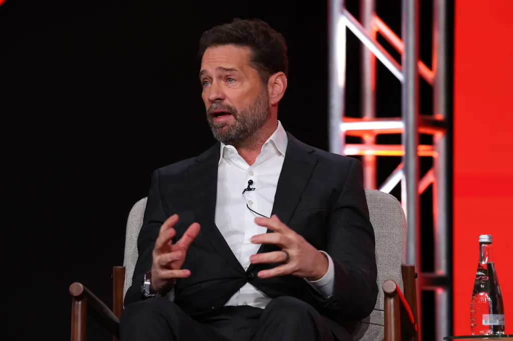Jason Priestley speaks onstage at The CW presentation of 