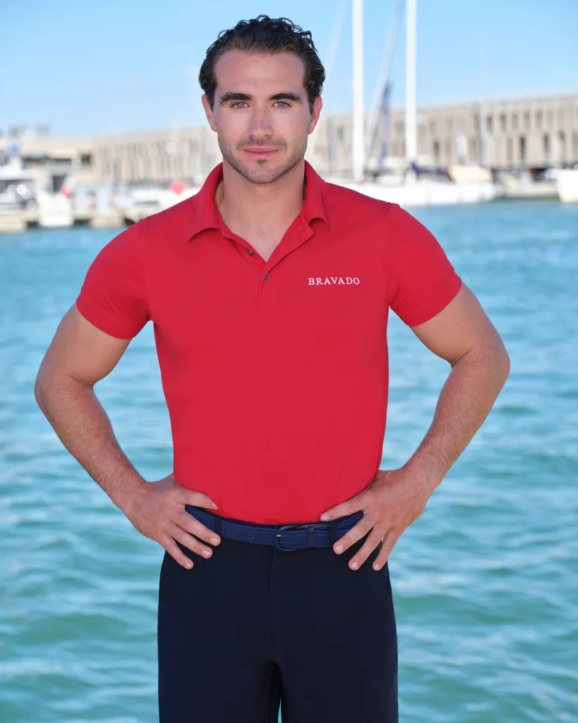 Joe Bradley wearing a red polo shirt with 