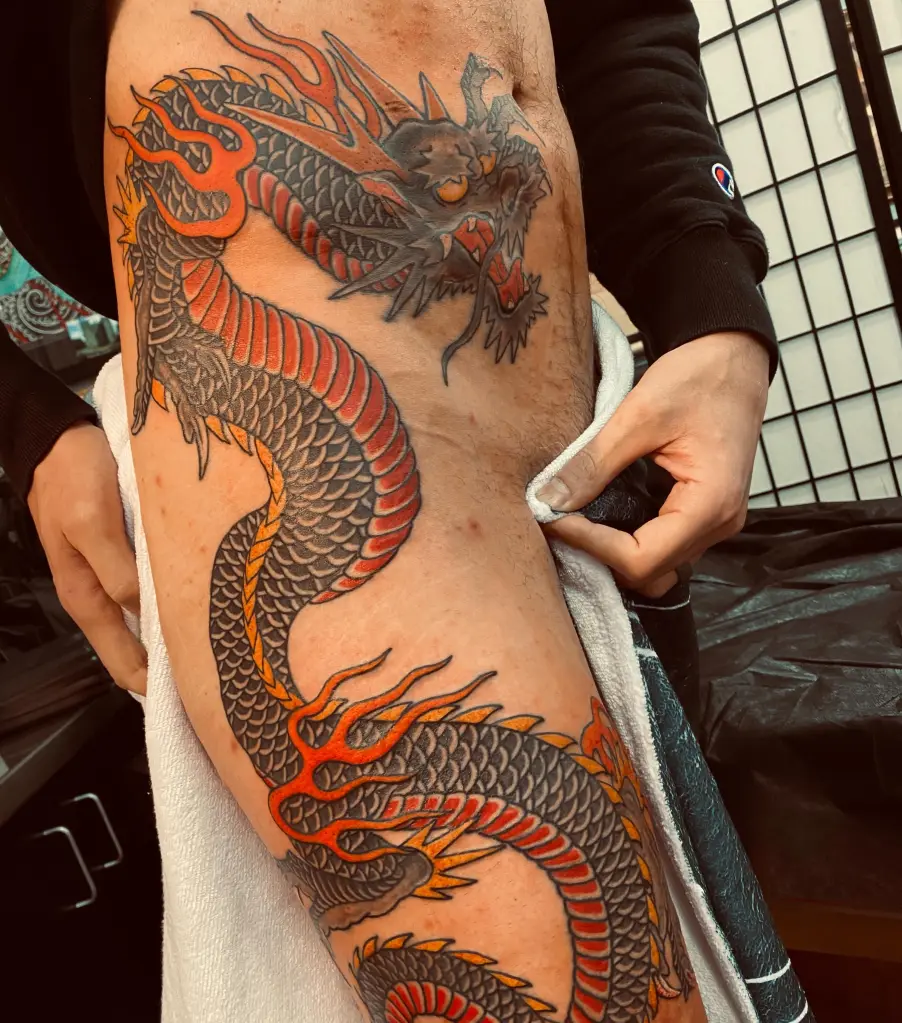 Joe Manganiello's massive dragon tattoo covering his torso and thigh.
