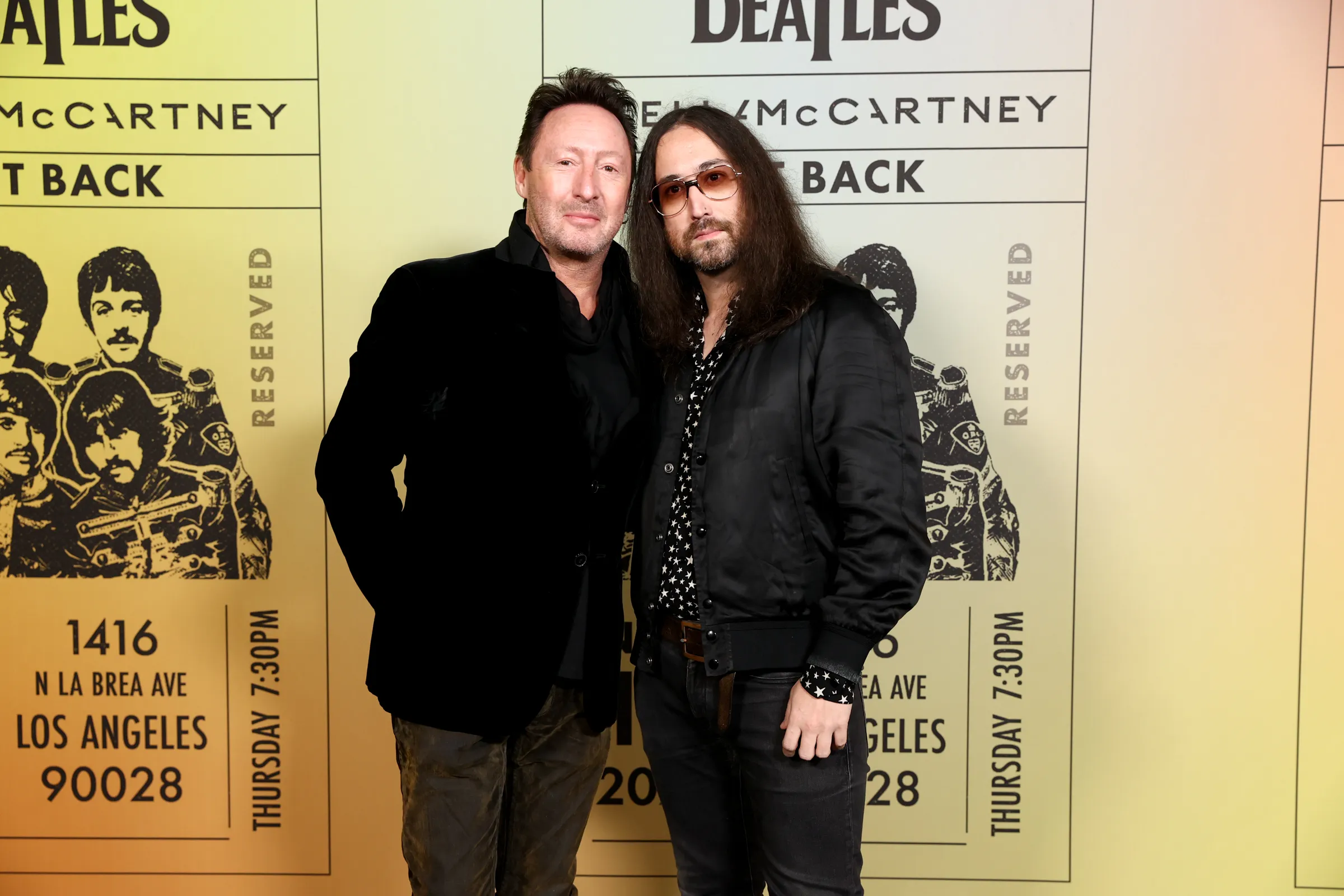 Julian Lennon and Sean Lennon standing together at an event.