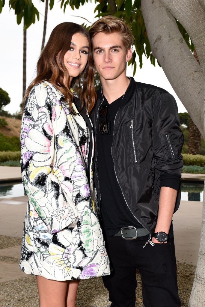 Kaia Gerber and Presley Gerber smiling.