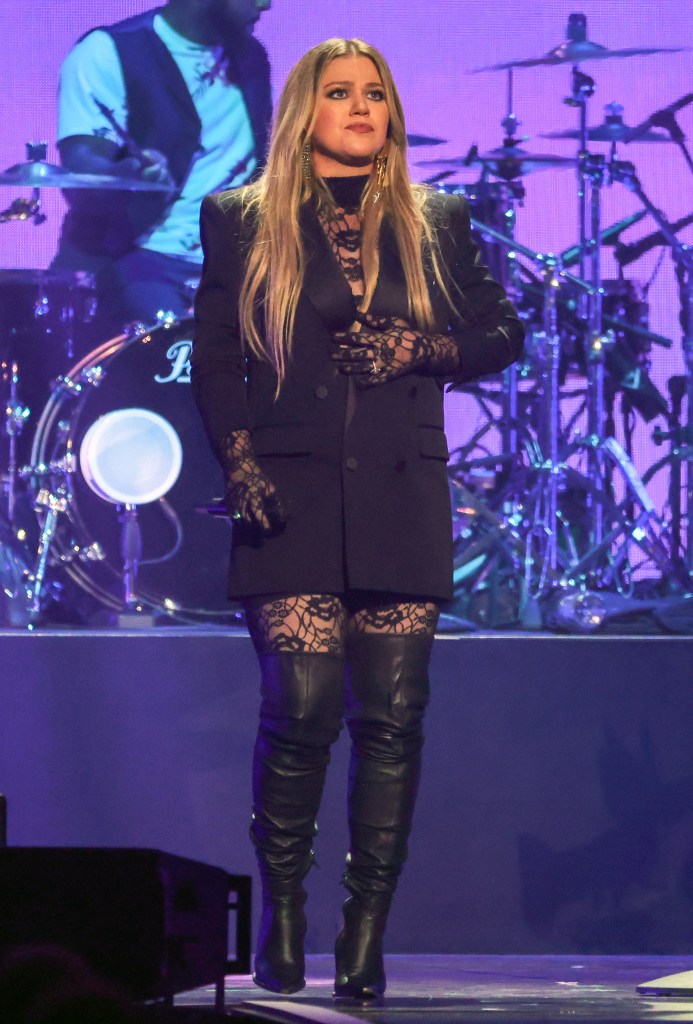 Kelly Clarkson performs onstage during a music festival.