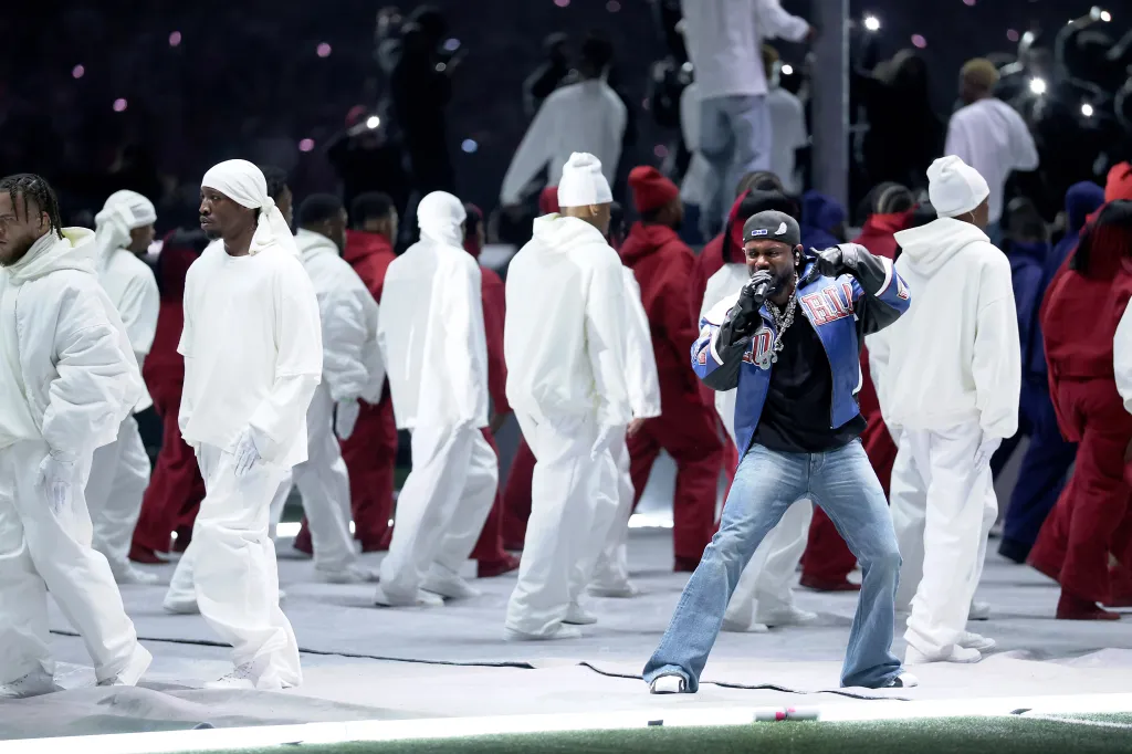 Kendrick Lamar performing onstage during the Super Bowl LIX Halftime Show.