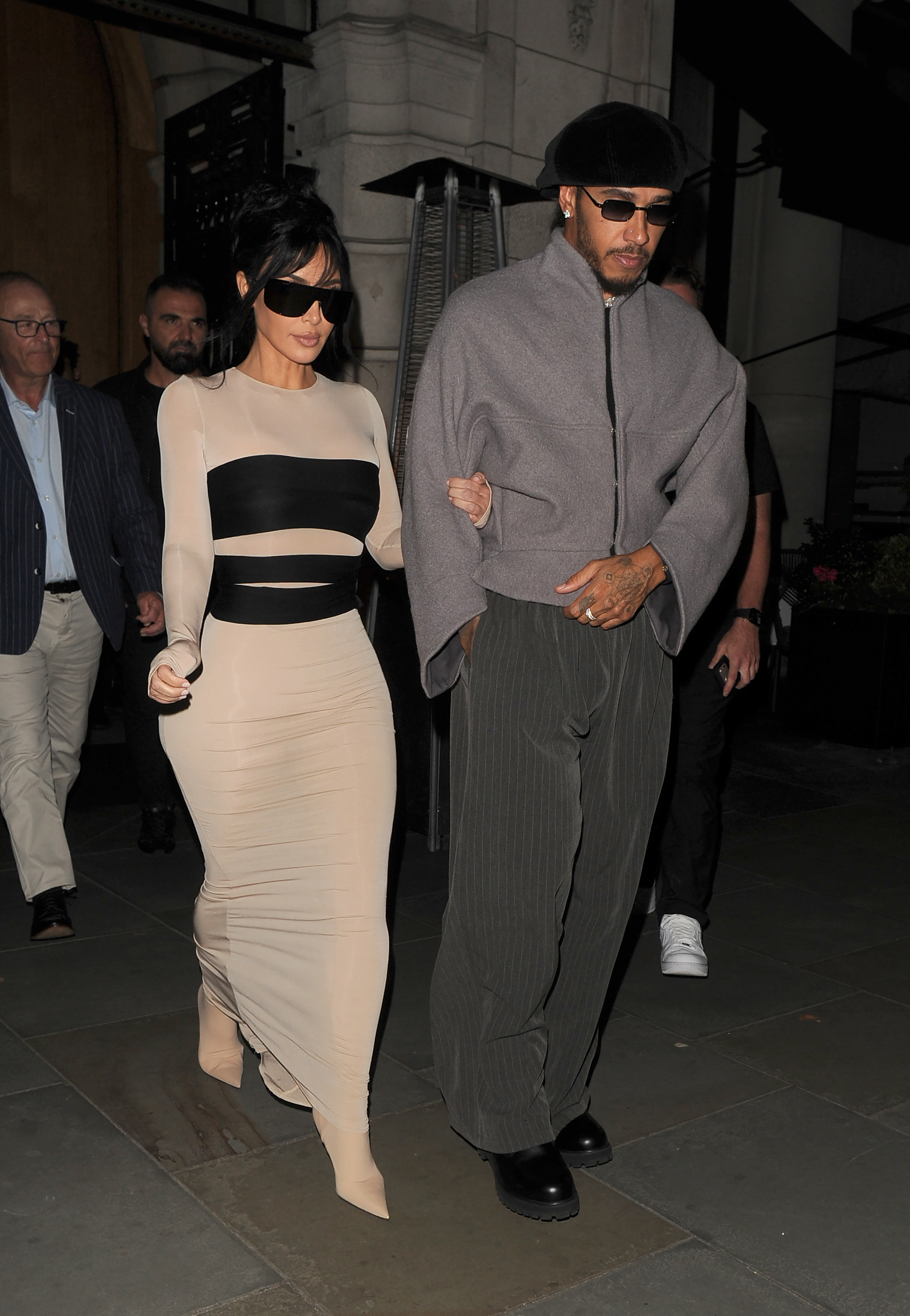 Kim Kardashian and Lewis Hamilton leaving a restaurant in London.