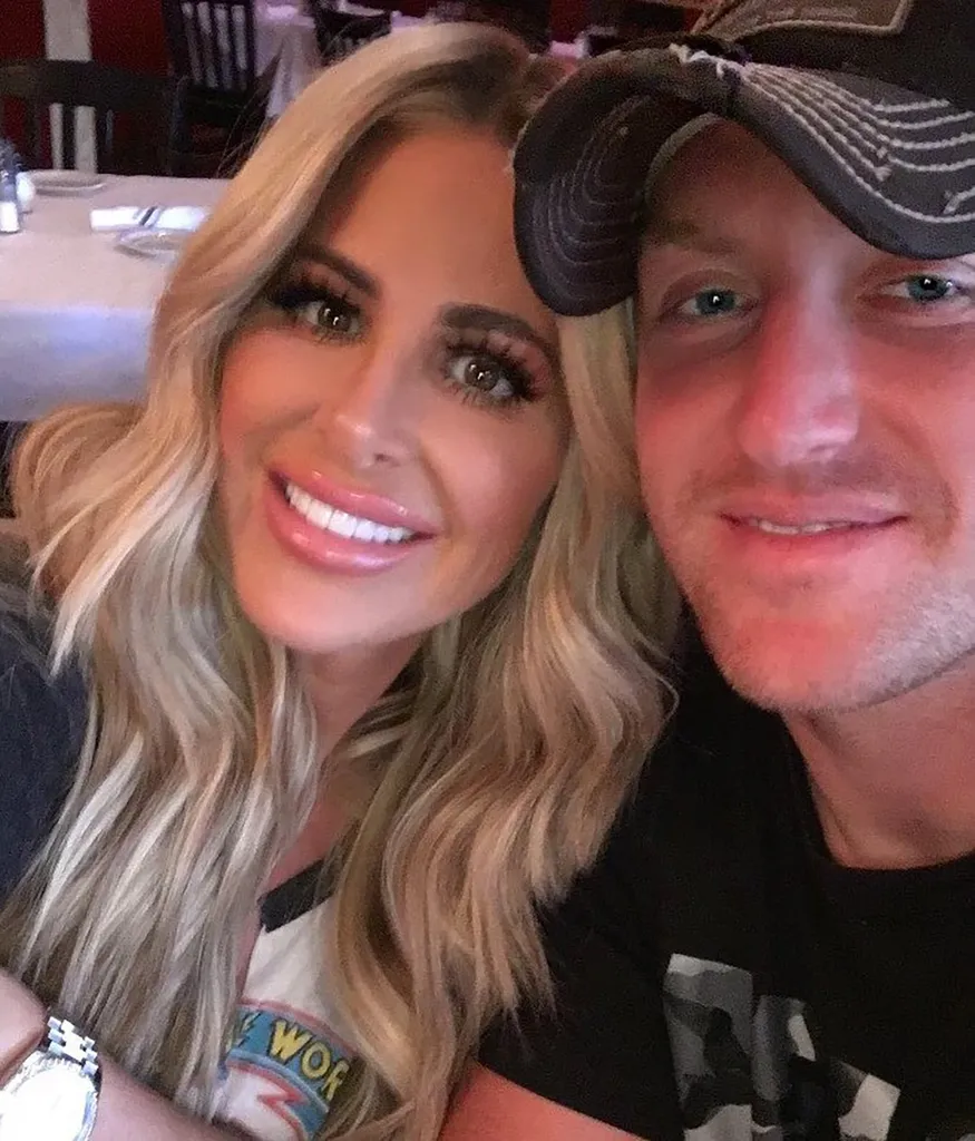 Kim Zolciak and Kroy Biermann smiling together.