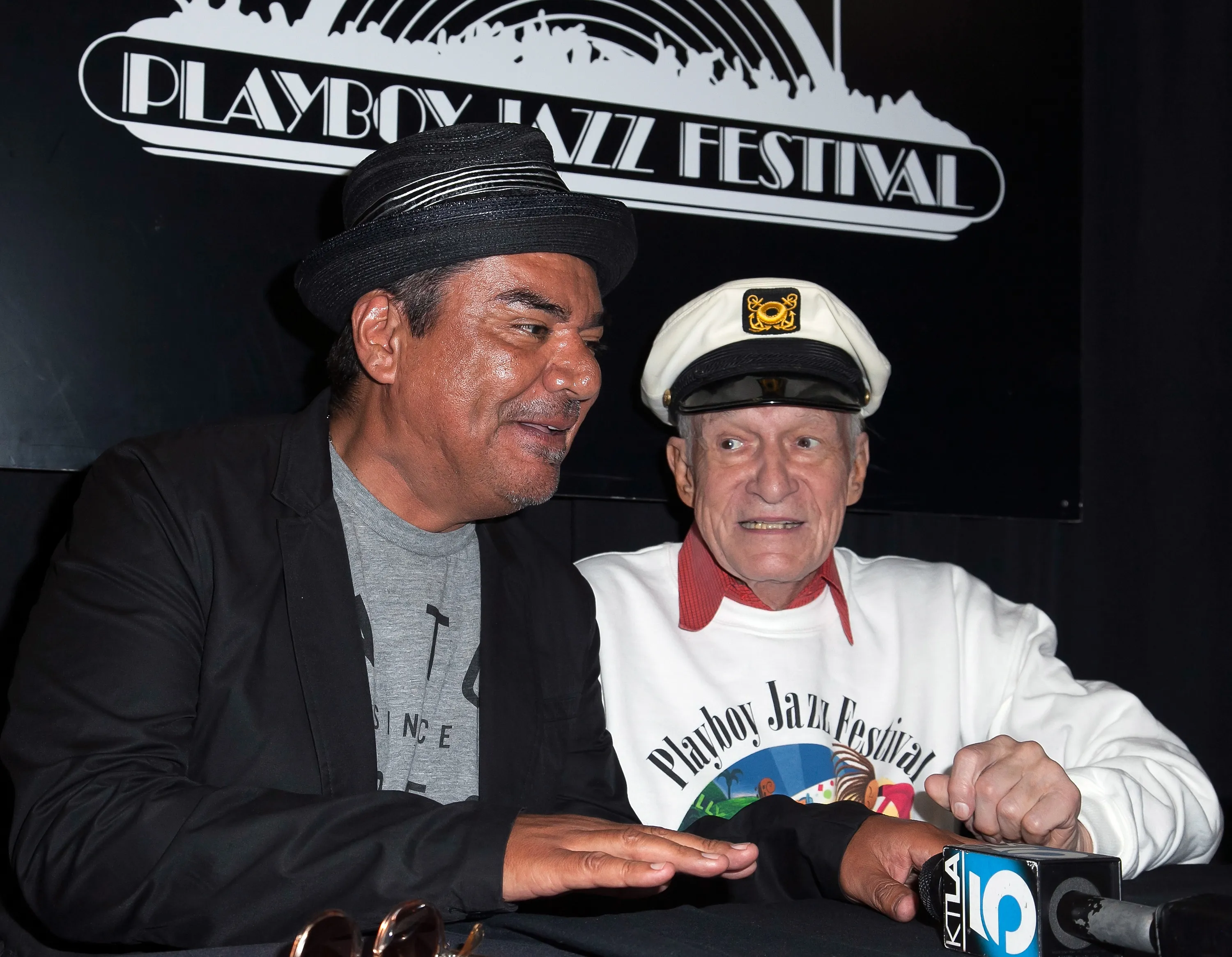 Host George Lopez and publisher Hugh Hefner at a press conference for the Playboy Jazz Festival.