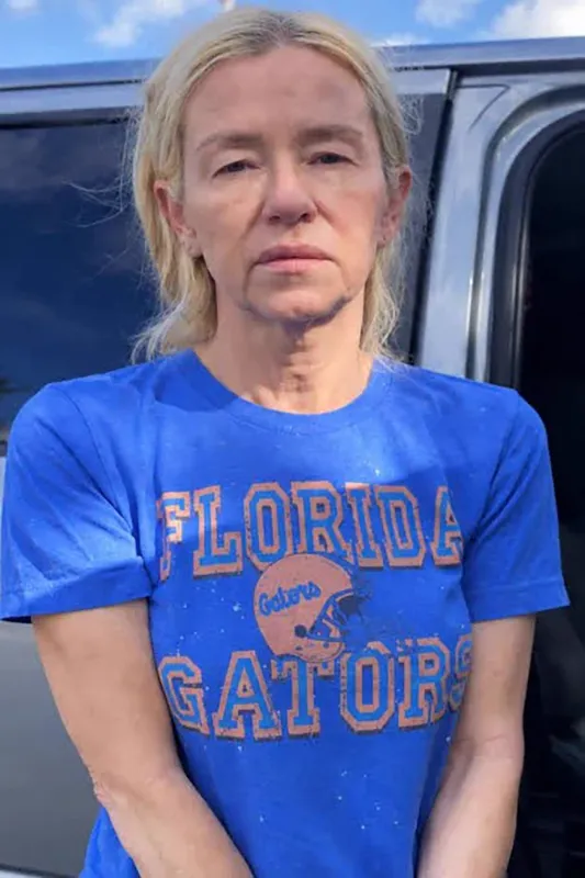 Leslie Ann Pope wearing a blue Florida Gators T-shirt.