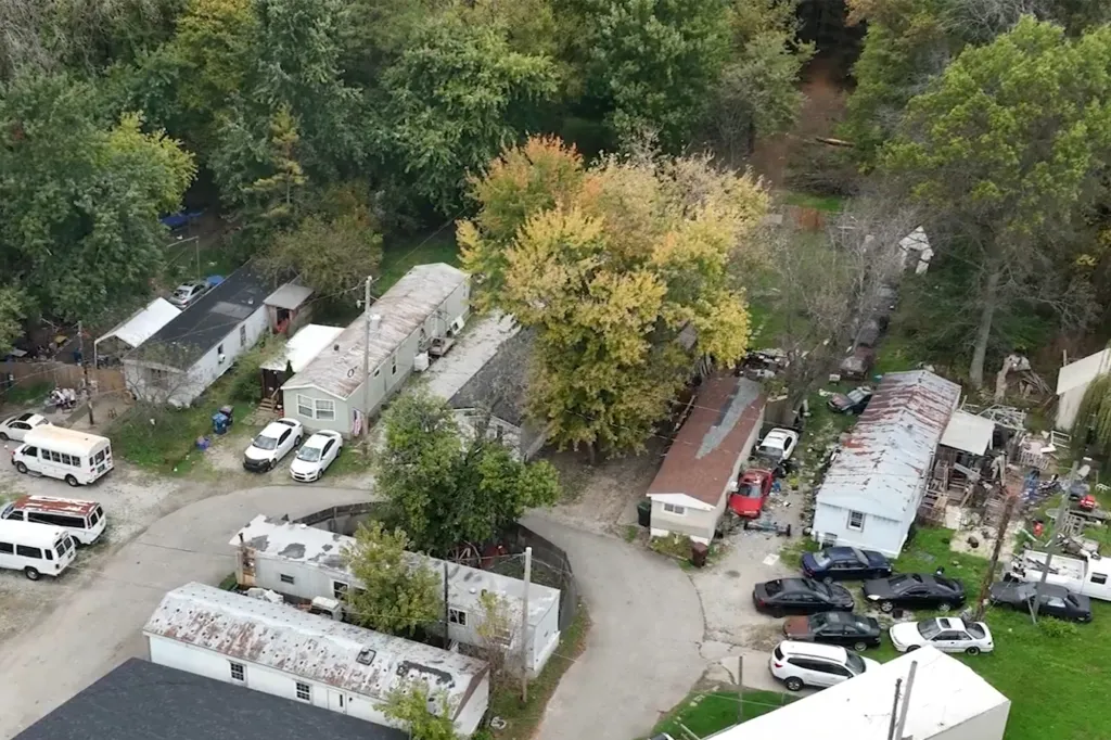 Aerial view of a residential property surrounded by trees in Etna Township, Ohio.