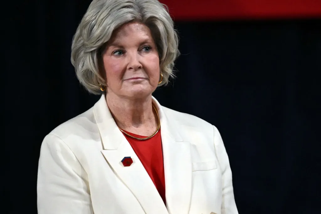 White House Chief of Staff Susie Wiles listens during a campaign rally.