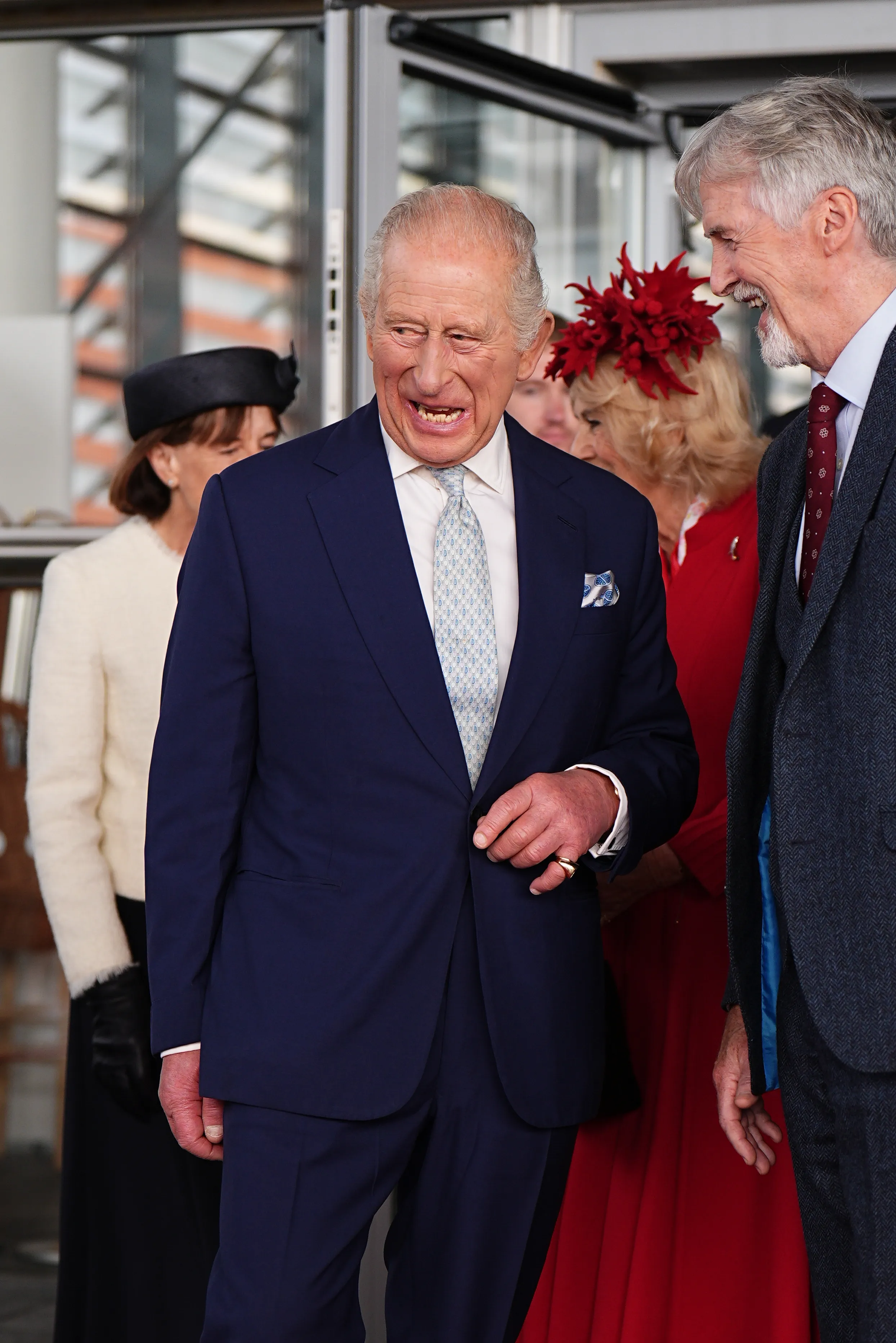 King Charles III laughs as he shares a joke with Huw Irranca-Davies MS, Llywydd (Presiding Officer) of the Senedd, following a visit to the Senedd in Cardiff for its ceremonial opening.