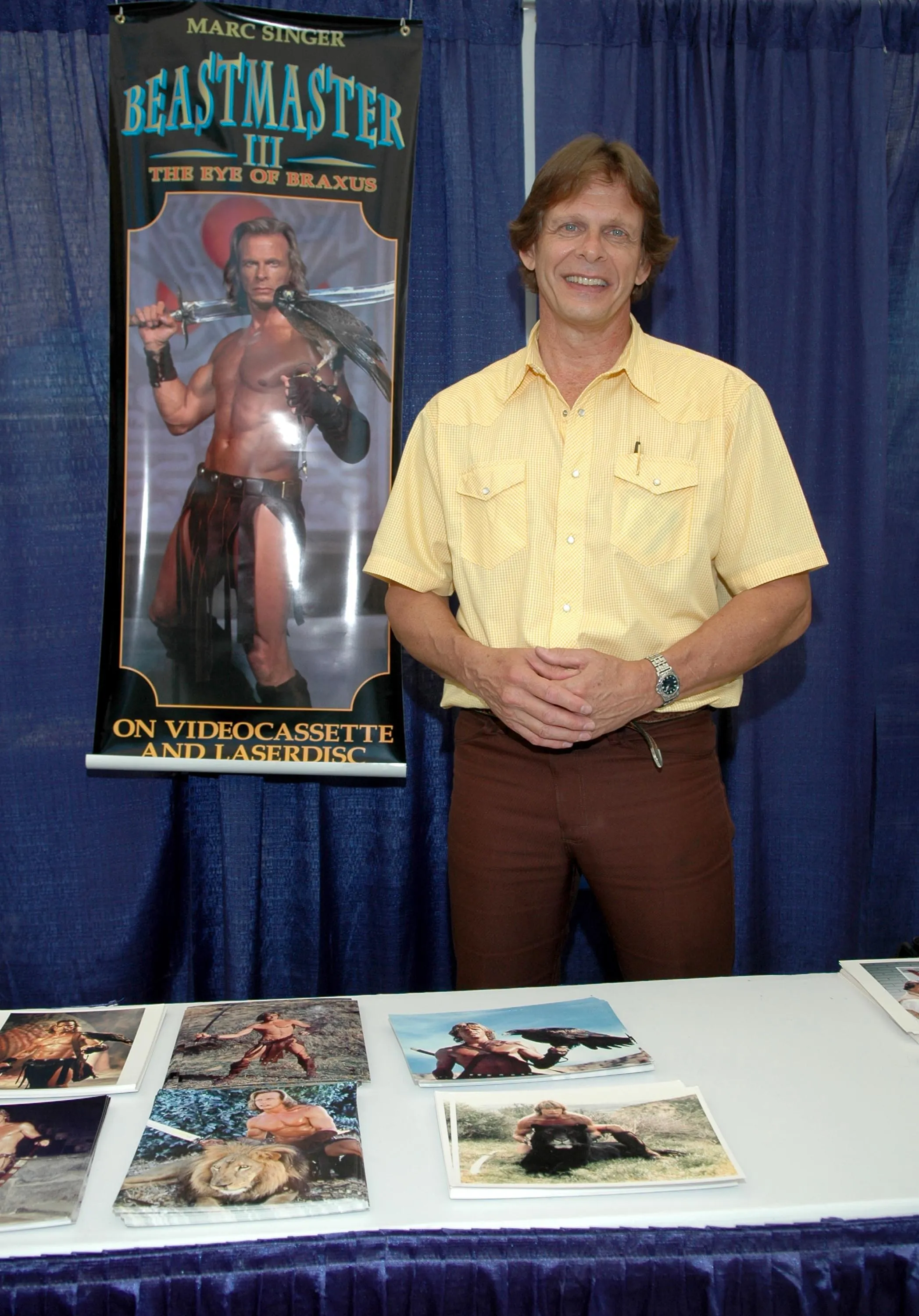 Marc Singer standing next to a 