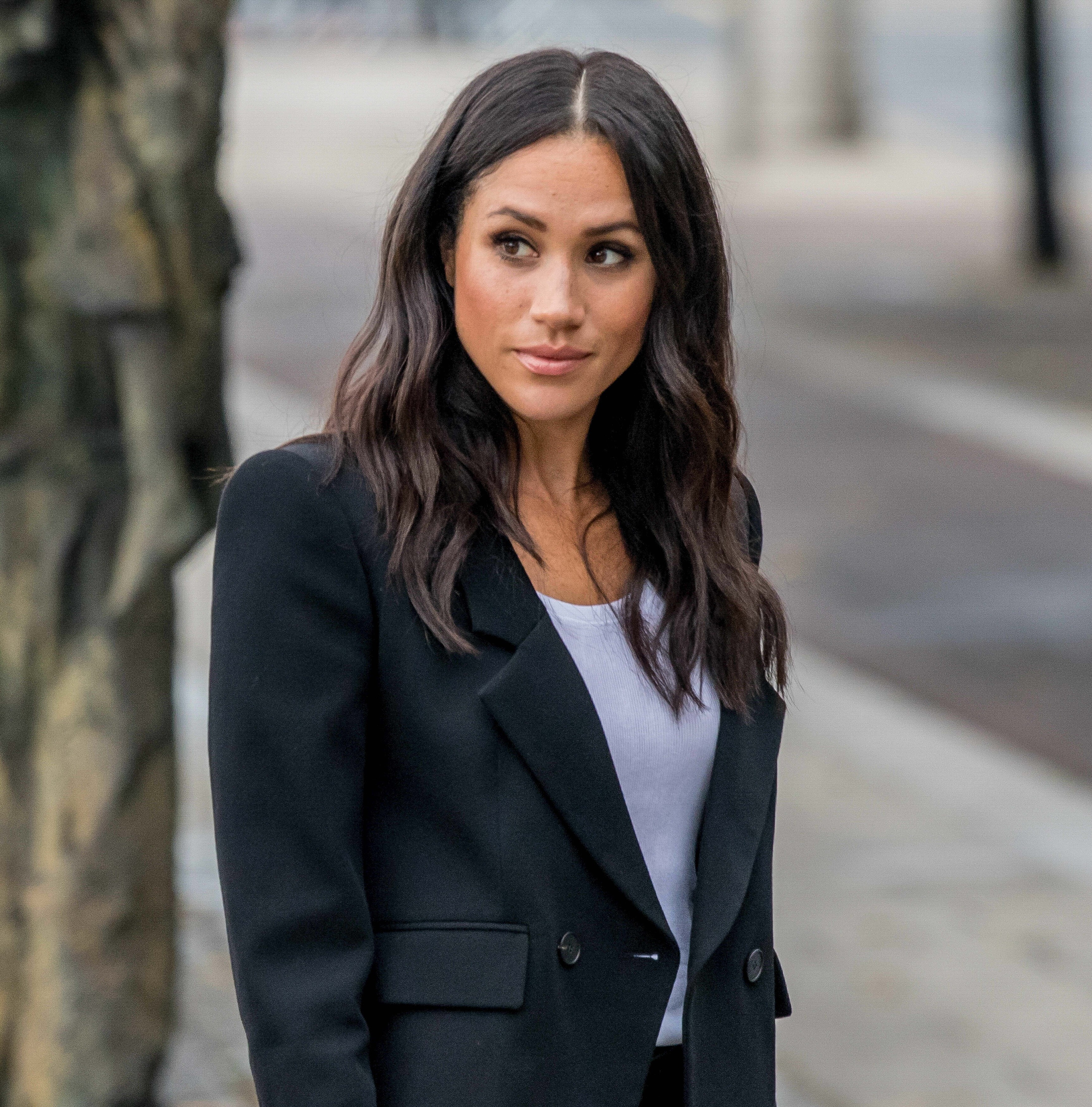 Meghan Markle, Duchess of Sussex, wearing a black blazer.