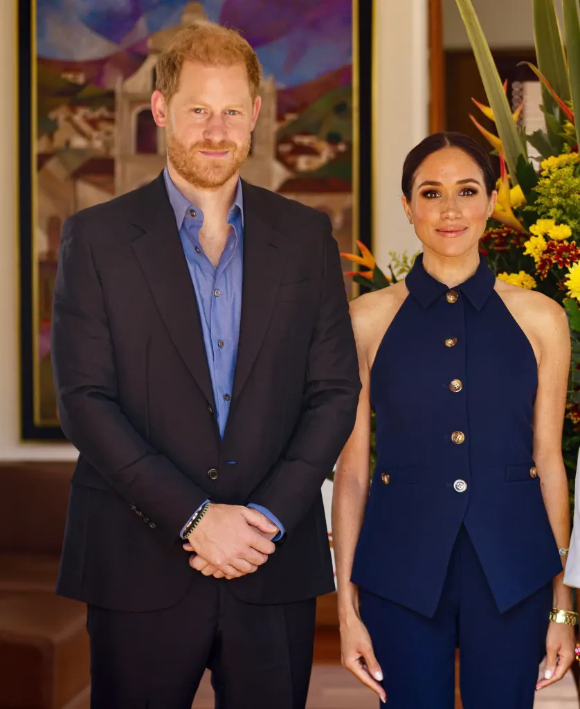 Prince Harry and Meghan Markle pose for a photograph together.