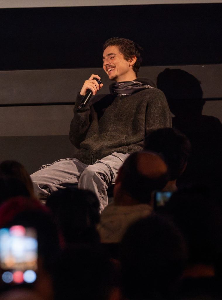 Timothée Chalamet speaks on stage during a conversation at Prince Charles Cinema in London.