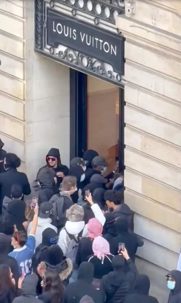 Looters enter a Louis Vuitton store in Bordeaux, France.