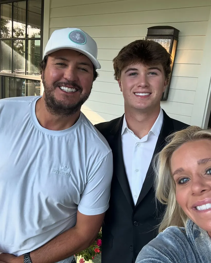 Luke Bryan poses for a selfie with his son Bo and wife Caroline.