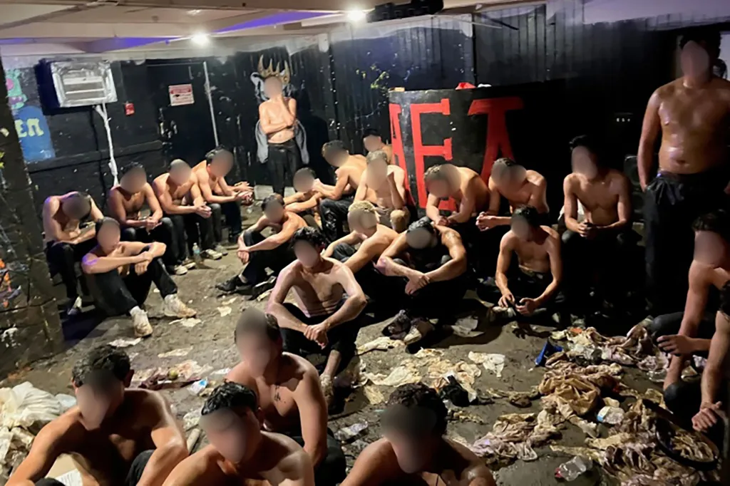 Police found about 30 partially clothed men, covered in food and condiments, in a fraternity basement following a hazing incident.